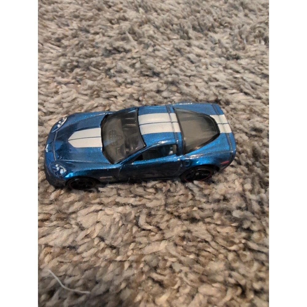 Hot Wheels 2010 Chevrolet Corvette Blue White Stripes 1/64 Scale Diecast Car